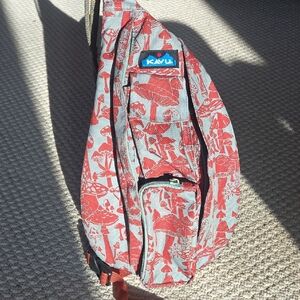 Kavu Red and Sage Patterned Sling Bag